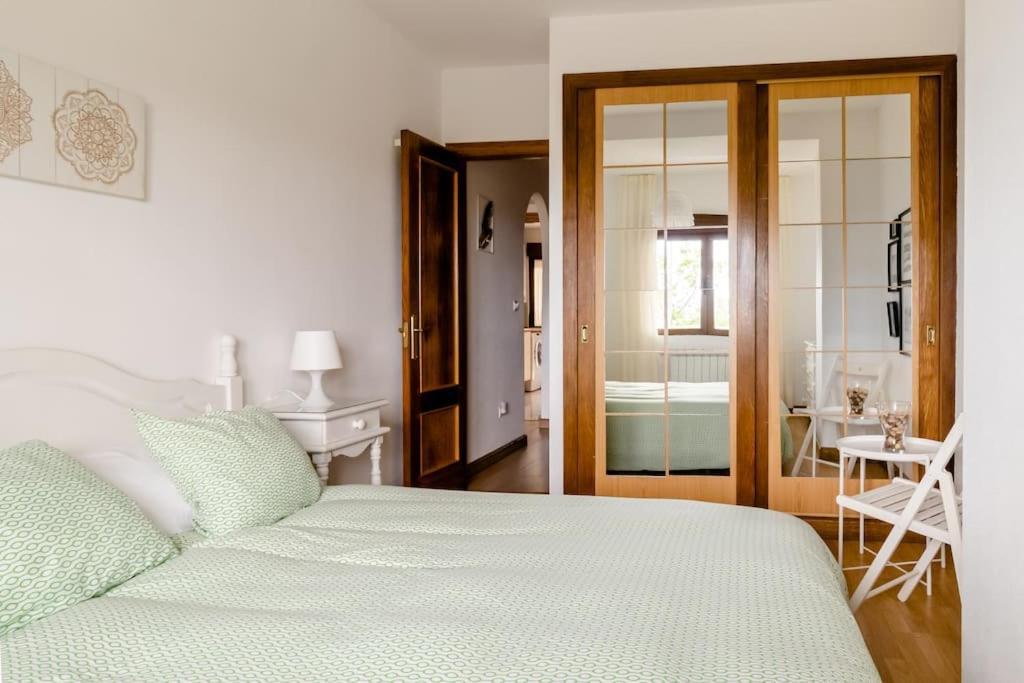 Casa De Las Flores - Apartamento Con Jardin Privado Frente A La Playa De Comillas Kültér fotó