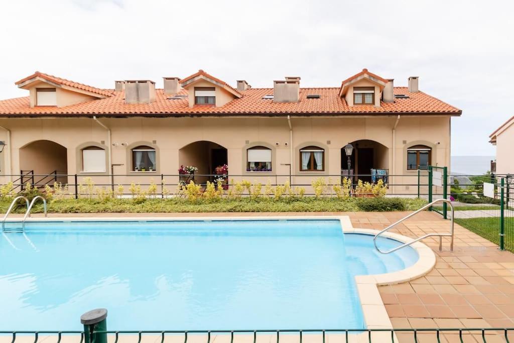 Casa De Las Flores - Apartamento Con Jardin Privado Frente A La Playa De Comillas Kültér fotó